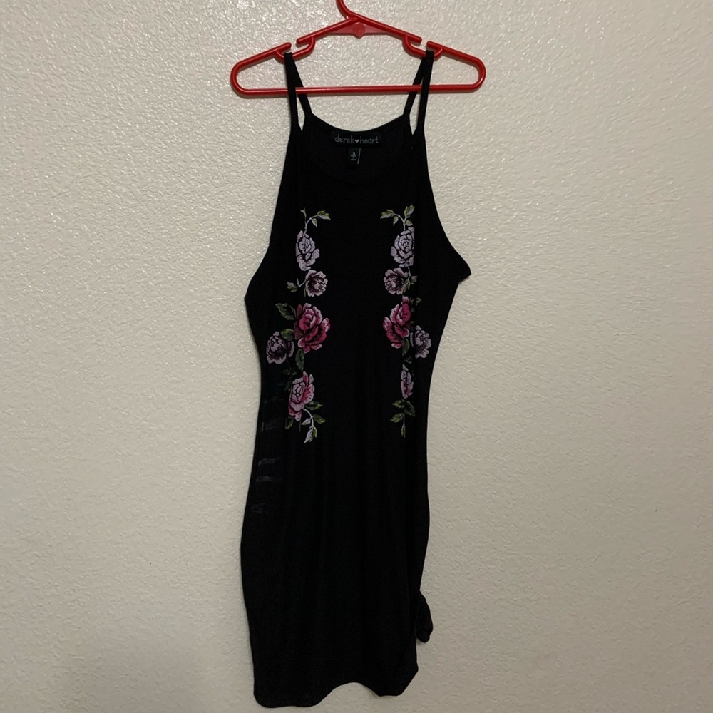 This nice black tight dress with a rose print